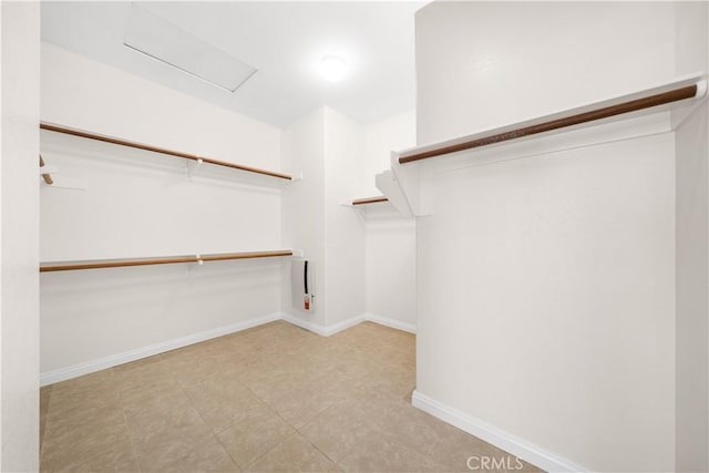 28677 Sunridge Ct, Menifee, CA 92584 - spacious closet featuring attic access