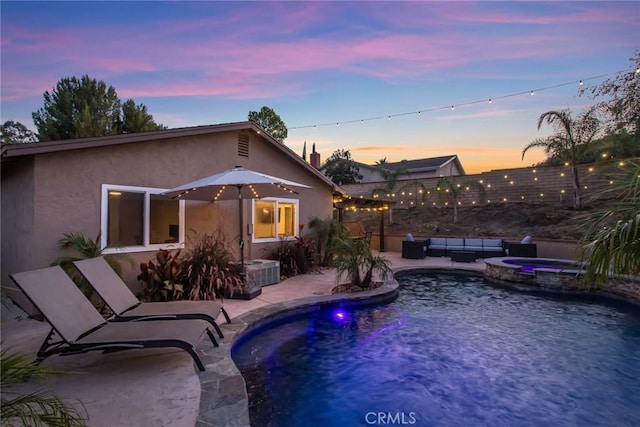 23235 Redbud Ridge Cir, Valencia, CA 91354 - view of swimming pool with a patio, an outdoor living space, and a pool with connected hot tub