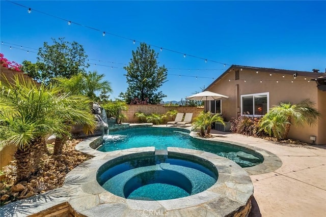 23235 Redbud Ridge Cir, Valencia, CA 91354 - view of swimming pool with a pool with connected hot tub and a patio
