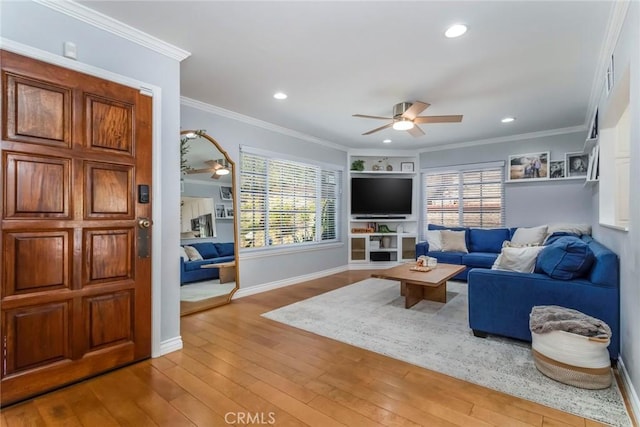 23235 Redbud Ridge Cir, Valencia, CA 91354 - living area with a ceiling fan, hardwood / wood-style floors, healthy amount of natural light, ornamental molding, and recessed lighting
