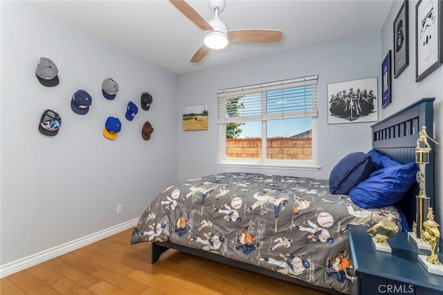 23235 Redbud Ridge Cir, Valencia, CA 91354 - bedroom with wood finished floors and ceiling fan