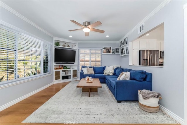 23235 Redbud Ridge Cir, Valencia, CA 91354 - living area featuring ceiling fan, crown molding, wood finished floors, and recessed lighting