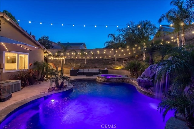 23235 Redbud Ridge Cir, Valencia, CA 91354 - pool at twilight with a patio, a pool with connected hot tub, and outdoor lounge area