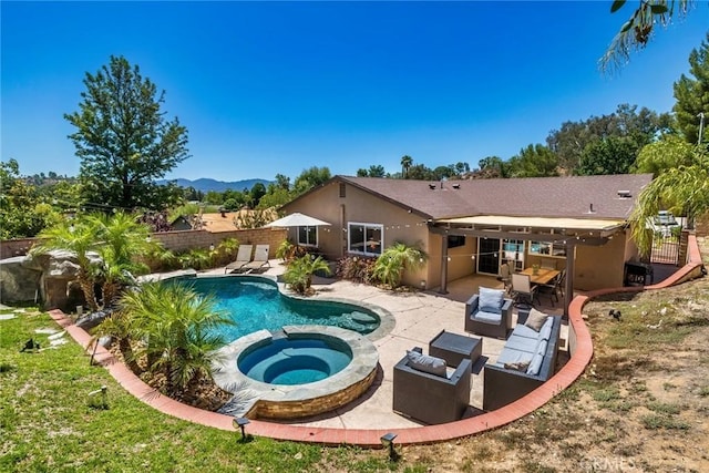 23235 Redbud Ridge Cir, Valencia, CA 91354 - view of swimming pool featuring a patio, a pool with connected hot tub, and a mountain view