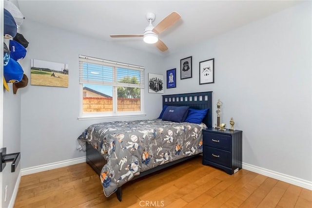23235 Redbud Ridge Cir, Valencia, CA 91354 - bedroom with hardwood / wood-style flooring and a ceiling fan