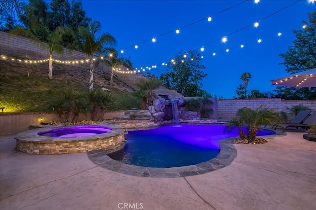 23235 Redbud Ridge Cir, Valencia, CA 91354 - pool at twilight with a patio, a fenced backyard, and a pool with connected hot tub