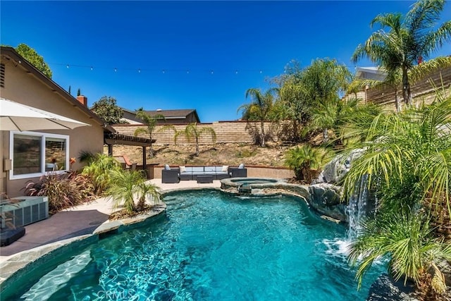 23235 Redbud Ridge Cir, Valencia, CA 91354 - view of pool with an outdoor living space, a fenced backyard, a pool with connected hot tub, and a patio area