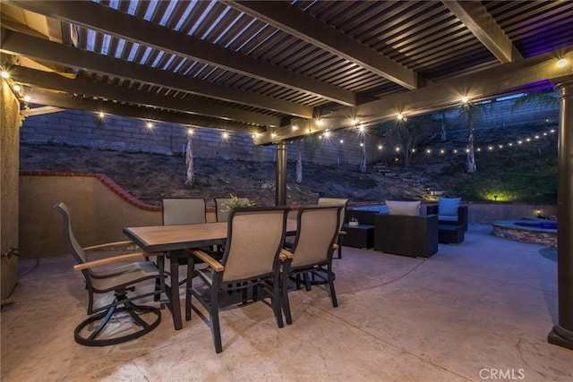 23235 Redbud Ridge Cir, Valencia, CA 91354 - patio at twilight featuring a hot tub, outdoor dining space, and a patio