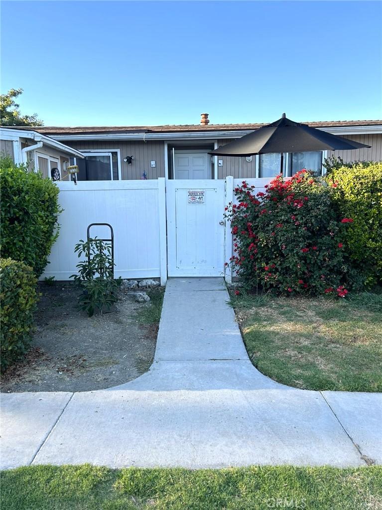 25821 Via Lomas Unit 216, Laguna Hills, CA 92653 - view of front of house with a gate