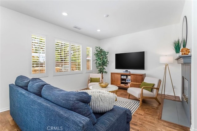 27960 Agapanthus Ln, Valencia, CA 91354 - living room with wood finished floors and recessed lighting