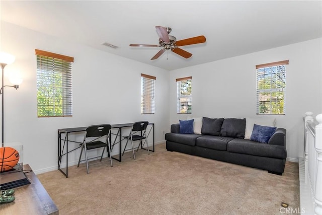 27960 Agapanthus Ln, Valencia, CA 91354 - living area featuring healthy amount of natural light, ceiling fan, and carpet flooring