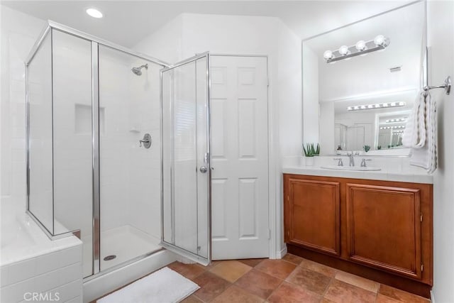 27960 Agapanthus Ln, Valencia, CA 91354 - bathroom featuring a shower stall, vanity, and recessed lighting