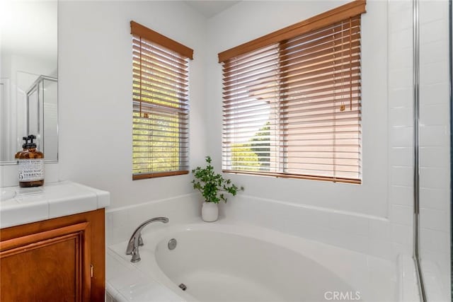 27960 Agapanthus Ln, Valencia, CA 91354 - full bath featuring vanity and a garden tub