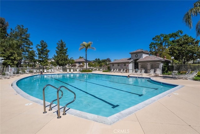 27960 Agapanthus Ln, Valencia, CA 91354 - community pool with a patio