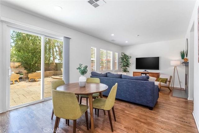 27960 Agapanthus Ln, Valencia, CA 91354 - dining area featuring healthy amount of natural light, light wood-style floors, and recessed lighting