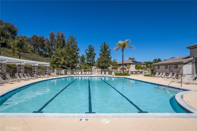 27960 Agapanthus Ln, Valencia, CA 91354 - community pool featuring a patio area