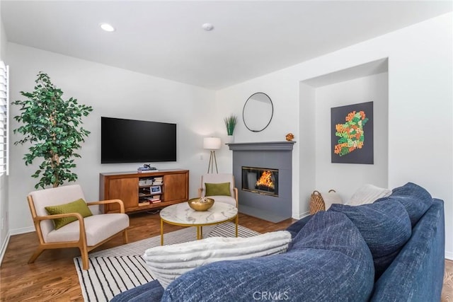 27960 Agapanthus Ln, Valencia, CA 91354 - living room with a tile fireplace, wood finished floors, and recessed lighting