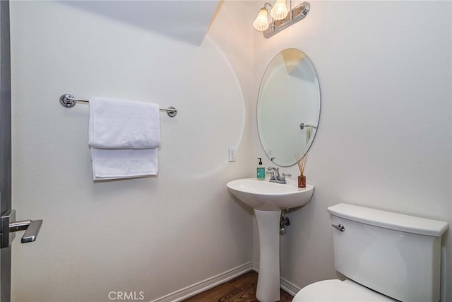 27960 Agapanthus Ln, Valencia, CA 91354 - bathroom with toilet and wood finished floors