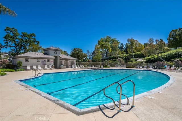 27960 Agapanthus Ln, Valencia, CA 91354 - community pool with a patio