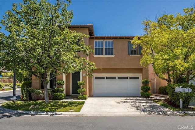 27960 Agapanthus Ln, Valencia, CA 91354 - view of front of house featuring stucco siding, driveway, a garage, and a tile roof