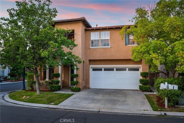 27960 Agapanthus Ln, Valencia, CA 91354 - multi unit property featuring concrete driveway, stucco siding, an attached garage, and a tile roof