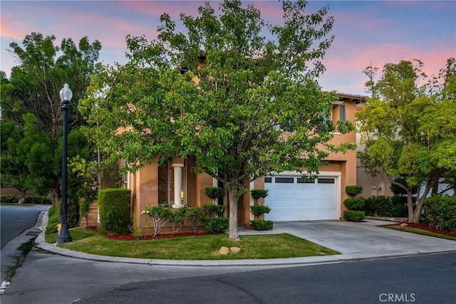 27960 Agapanthus Ln, Valencia, CA 91354 - view of property hidden behind natural elements with driveway and stucco siding