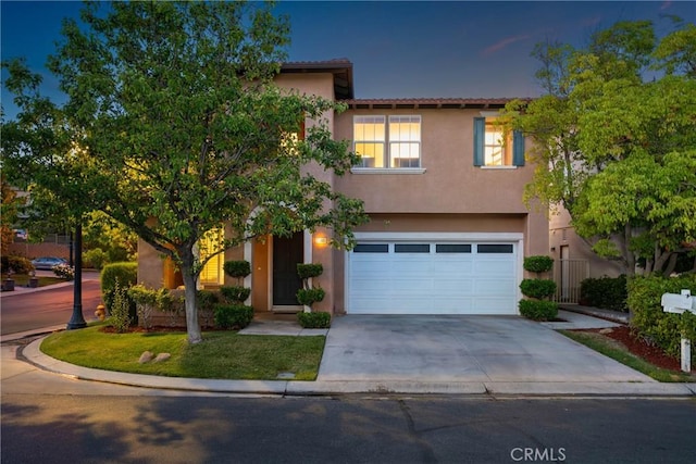 27960 Agapanthus Ln, Valencia, CA 91354 - view of front of house with concrete driveway, stucco siding, and an attached garage