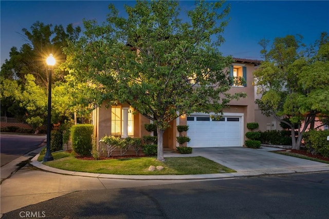27960 Agapanthus Ln, Valencia, CA 91354 - view of property hidden behind natural elements featuring stucco siding, concrete driveway, and a garage