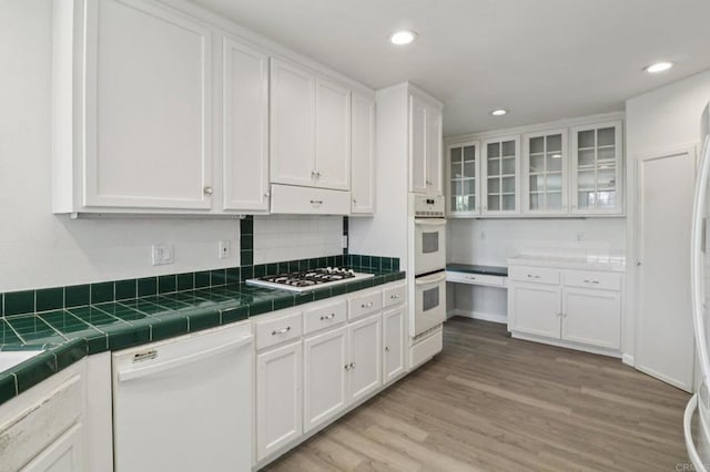 6737 San Miguel Ave, Lemon Grove, CA 91945 - kitchen featuring white appliances, white cabinetry, light wood-style flooring, and recessed lighting