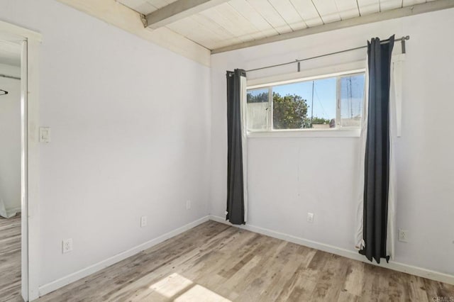 6737 San Miguel Ave, Lemon Grove, CA 91945 - empty room with wood finished floors and a wood ceiling with exposed beams