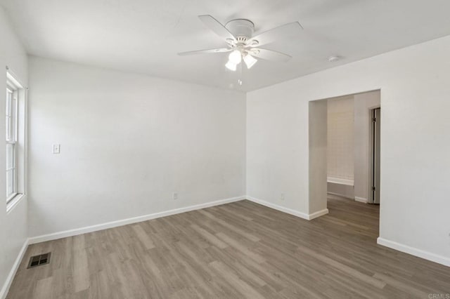 6737 San Miguel Ave, Lemon Grove, CA 91945 - empty room with wood finished floors, ceiling fan, and a smoke detector