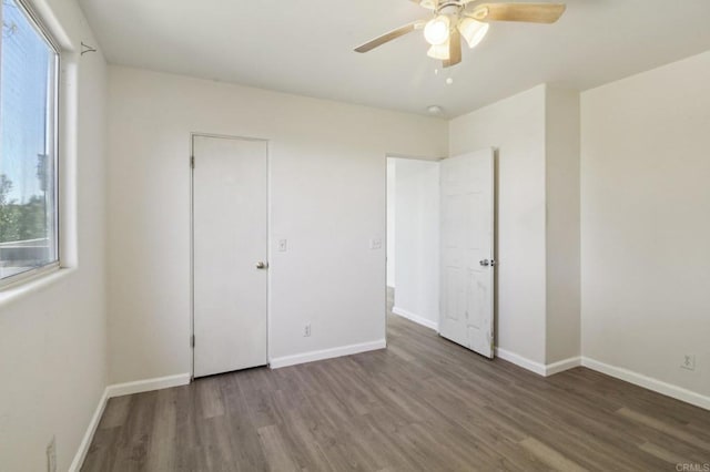 6737 San Miguel Ave, Lemon Grove, CA 91945 - unfurnished bedroom featuring wood finished floors and a ceiling fan