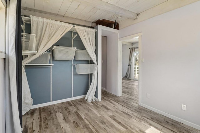 6737 San Miguel Ave, Lemon Grove, CA 91945 - unfurnished bedroom with a wood ceiling with exposed beams and wood finished floors