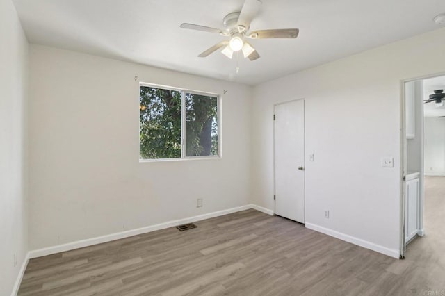 6737 San Miguel Ave, Lemon Grove, CA 91945 - unfurnished bedroom with wood finished floors and a ceiling fan