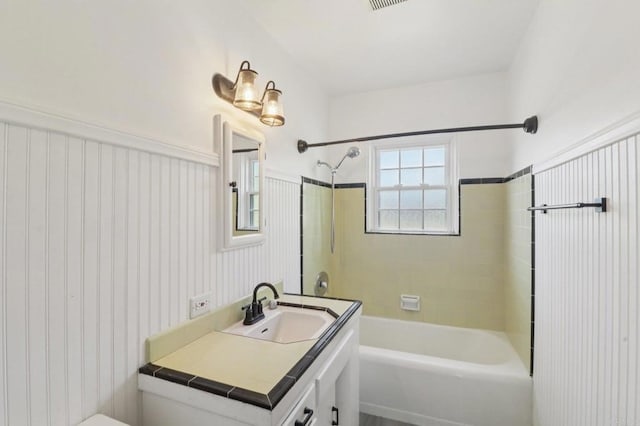 6737 San Miguel Ave, Lemon Grove, CA 91945 - full bath featuring vanity, bathtub / shower combination, and a wainscoted wall