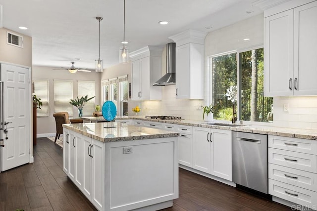 1467 Belmont Park Rd, Oceanside, CA 92057 - kitchen featuring stainless steel appliances, wall chimney exhaust hood, tasteful backsplash, a center island, and plenty of natural light