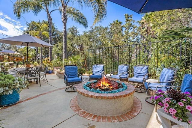 1467 Belmont Park Rd, Oceanside, CA 92057 - fenced backyard featuring an outdoor fire pit and a patio area