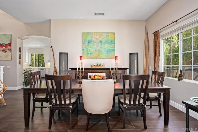 1467 Belmont Park Rd, Oceanside, CA 92057 - dining room with arched walkways and wood finished floors