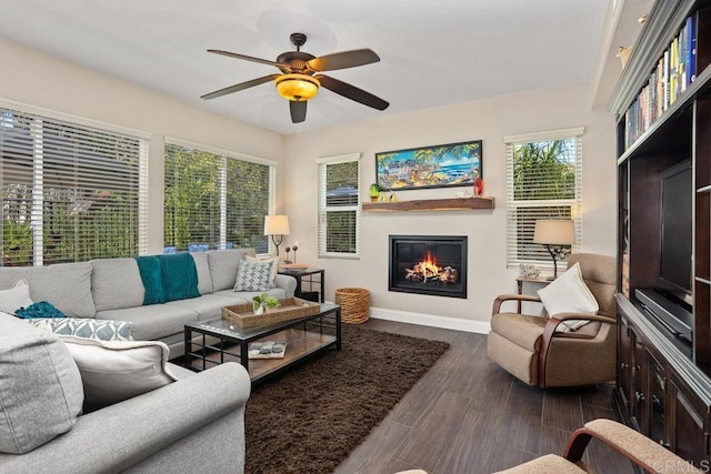 1467 Belmont Park Rd, Oceanside, CA 92057 - living area with a lit fireplace, a ceiling fan, and dark wood finished floors