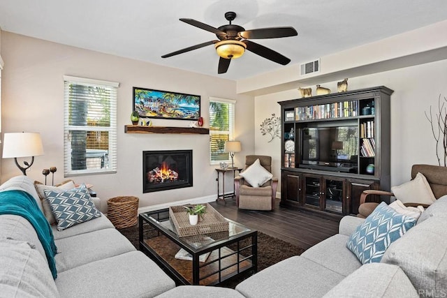 1467 Belmont Park Rd, Oceanside, CA 92057 - living room featuring wood finished floors, a glass covered fireplace, and ceiling fan