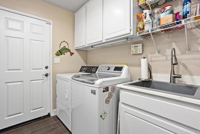 1467 Belmont Park Rd, Oceanside, CA 92057 - laundry room with washer and clothes dryer, cabinet space, and dark wood-style floors