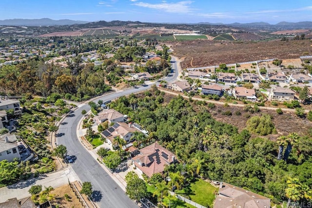 1467 Belmont Park Rd, Oceanside, CA 92057 - aerial overview of property's location with a mountainous background and nearby suburban area