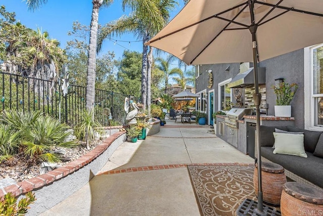 1467 Belmont Park Rd, Oceanside, CA 92057 - fenced backyard with an outdoor kitchen, a patio, and outdoor dining space
