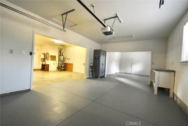913 Northview Cir, Yreka, CA 96097 - garage featuring a garage door opener and water heater