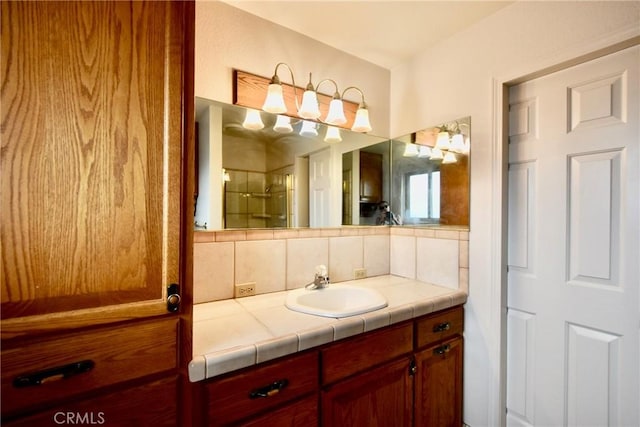 913 Northview Cir, Yreka, CA 96097 - bathroom with vanity, a stall shower, and tasteful backsplash