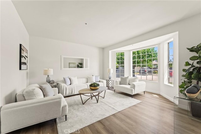 5255 La Madera Ave, El Monte, CA 91732 - living area featuring wood finished floors and baseboards