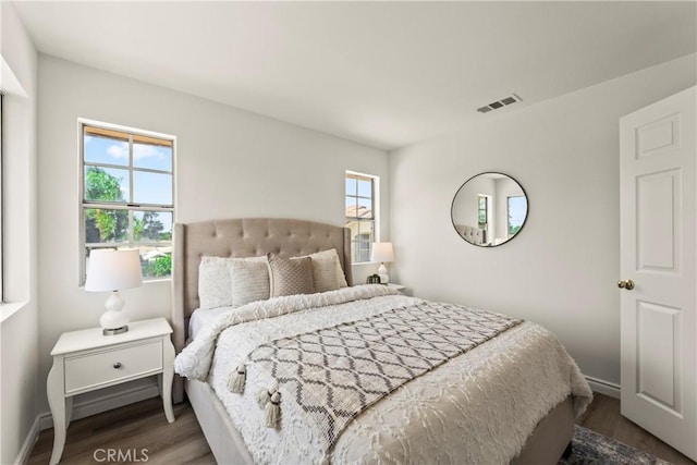 5255 La Madera Ave, El Monte, CA 91732 - bedroom featuring wood finished floors and multiple windows