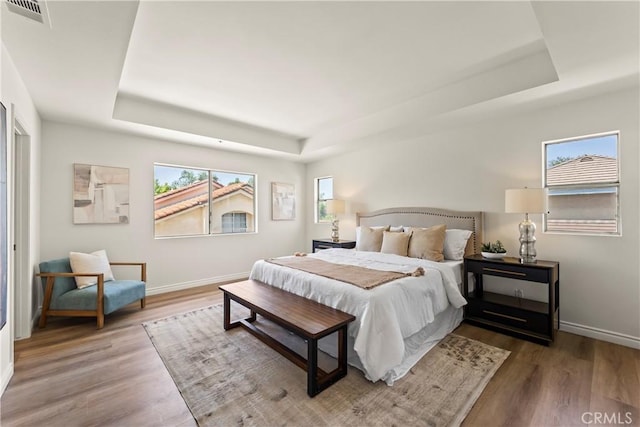 5255 La Madera Ave, El Monte, CA 91732 - bedroom with a tray ceiling and wood finished floors