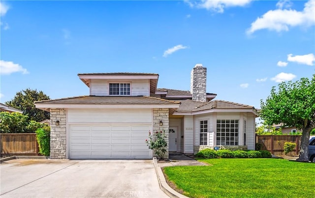 5255 La Madera Ave, El Monte, CA 91732 - traditional-style home featuring stone siding, driveway, a garage, a tile roof, and a chimney
