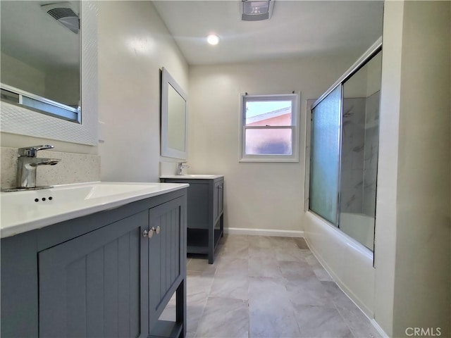 17623 Clymer St, Granada Hills, CA 91344 - bathroom featuring two vanities and enclosed tub / shower combo